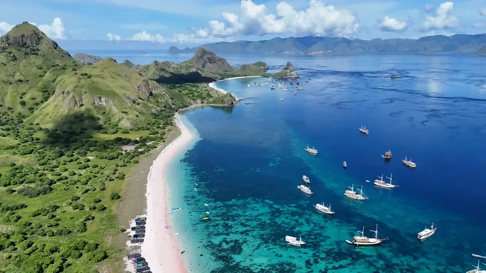 A phinisi anchored off Pink Beach in Komodo National Park